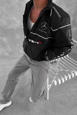 Formula 1 fan wearing Mercedes F1 Jacket at Grand Prix event