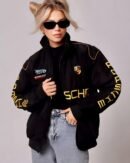 Side view of the Porsche bomber jacket highlighting its comfortable fit and premium fabric.