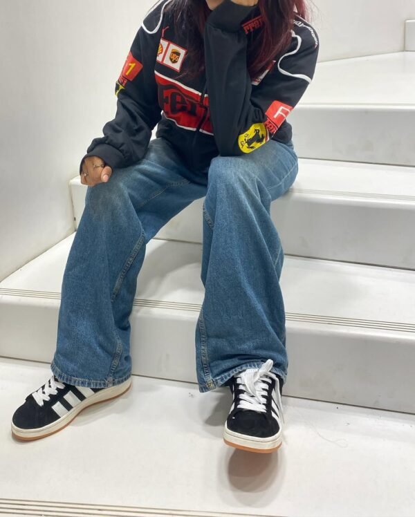 Model wearing Black Ferrari F1 Jacket – official F1 merchandise Ferrari