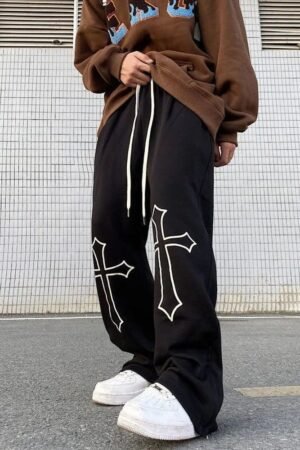 Close-up of cross print pants streetwear detail