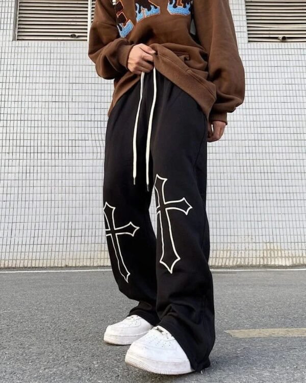 Close-up of cross print pants streetwear detail