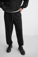 Close-up of Zerodas Classic Black Track Pant highlighting drawstring waistband and modern jogger style