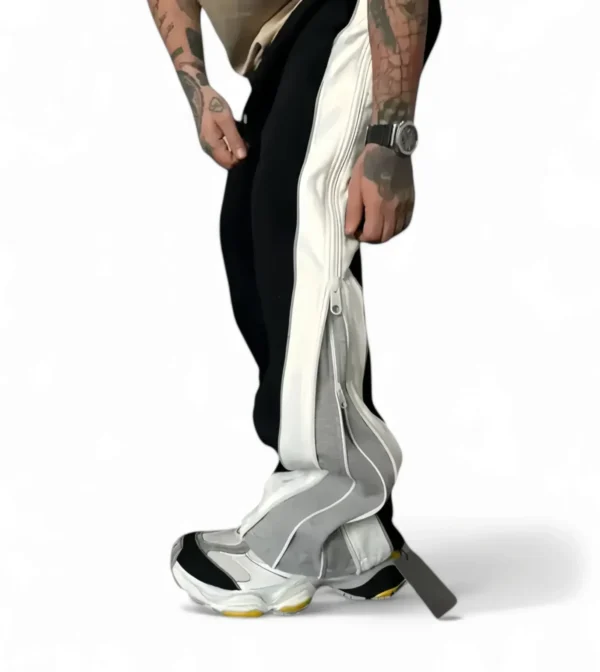 Side view of duo zipper relaxed fit track pant showcasing zip detail