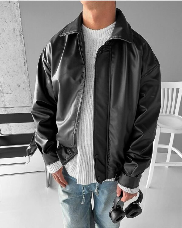 Close-up of zipper and hardware on vintage black leather jacket Zerodas